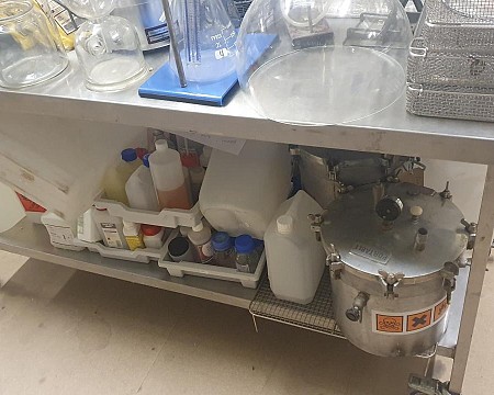 crate of lab bottles qty