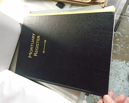 qty mortuary folders mortuary book and 1 sign 