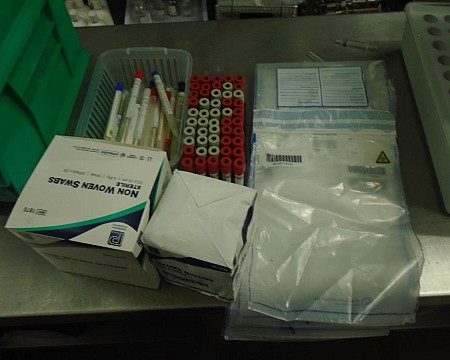 evidence bags swabs yellow bin bags and red + vacutainers 