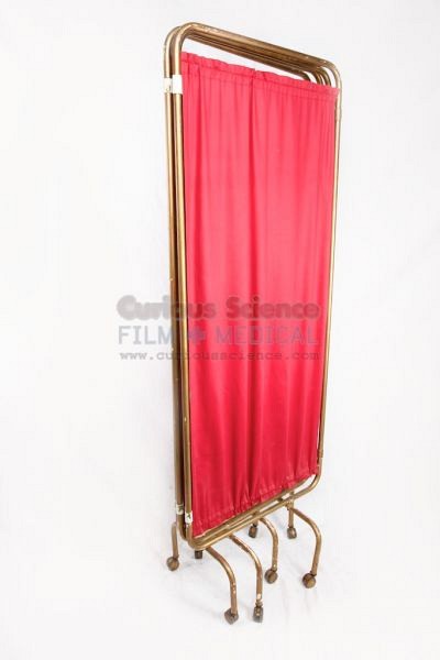 Hospital screen with red fabric